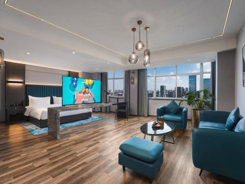 Imagen de la habitación del Hotel Park Inn by Radisson Hanzhong Central Square & High speed rail station. Foto 20