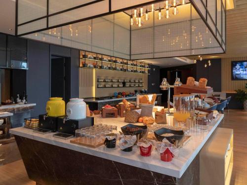 Imagen general del Hotel Park Inn by Radisson Jilin Beishan Park&Songhua River. Foto 6