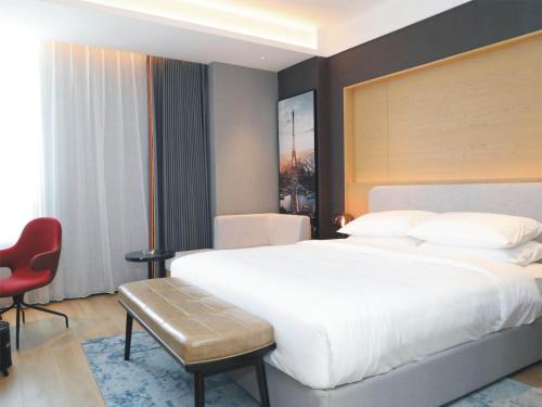 Imagen de la habitación del Hotel Park Inn by Radisson Jilin Beishan Park&Songhua River. Foto 15