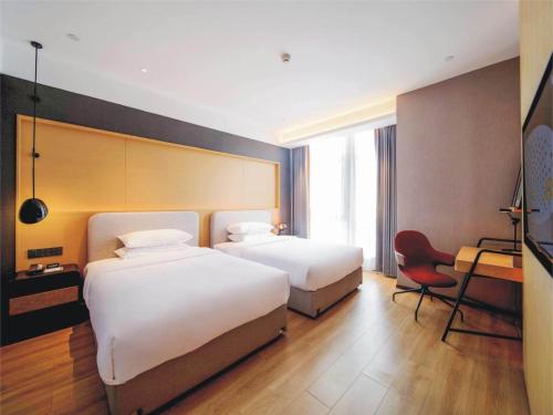 Imagen de la habitación del Hotel Park Inn by Radisson Jilin Beishan Park&Songhua River. Foto 16