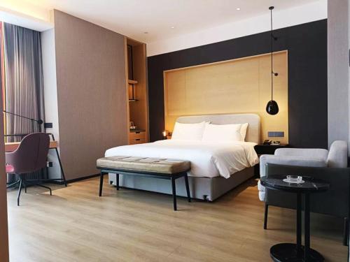 Imagen de la habitación del Hotel Park Inn by Radisson Jilin Beishan Park&Songhua River. Foto 17