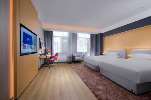 Imagen de la habitación del Hotel Park Inn by Radisson Jilin Beishan Park&Songhua River. Foto 18