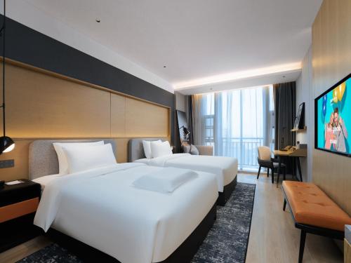 Imagen de la habitación del Hotel Park Inn by Radisson Nanjing North Zhongshan Road. Foto 11