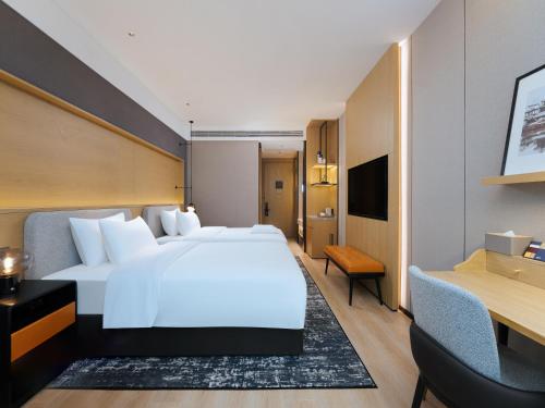 Imagen de la habitación del Hotel Park Inn by Radisson Nanjing North Zhongshan Road. Foto 12