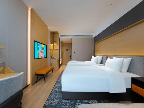 Imagen de la habitación del Hotel Park Inn by Radisson Nanjing North Zhongshan Road. Foto 13