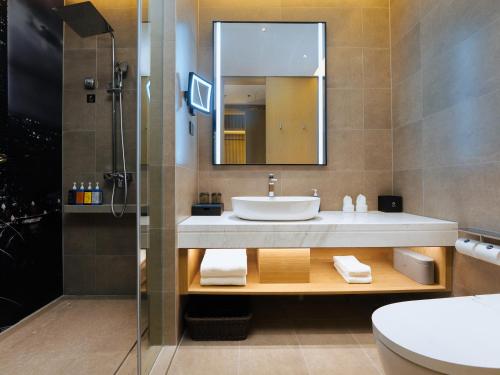 Imagen de la habitación del Hotel Park Inn by Radisson Nanjing North Zhongshan Road. Foto 16