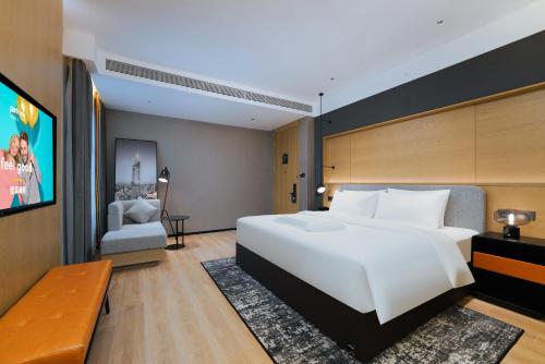 Imagen de la habitación del Hotel Park Inn by Radisson Nanjing North Zhongshan Road. Foto 17