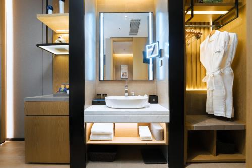 Imagen de la habitación del Hotel Park Inn by Radisson Nanjing North Zhongshan Road. Foto 18