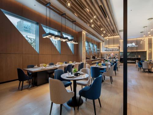 Imagen del bar/restaurante del Hotel Park Inn by Radisson Shanghai Shanghai Middle Jiasong Road Outlets. Foto 13
