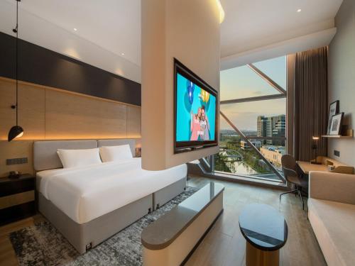 Imagen de la habitación del Hotel Park Inn by Radisson Shanghai Shanghai Middle Jiasong Road Outlets. Foto 19