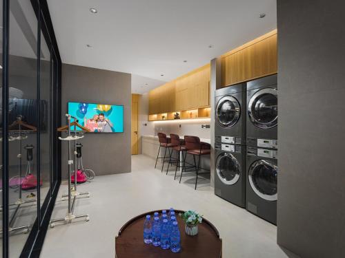 Imagen general del Hotel Park Inn by Radisson Tianjin Jinghai Wanda Plaza. Foto 4