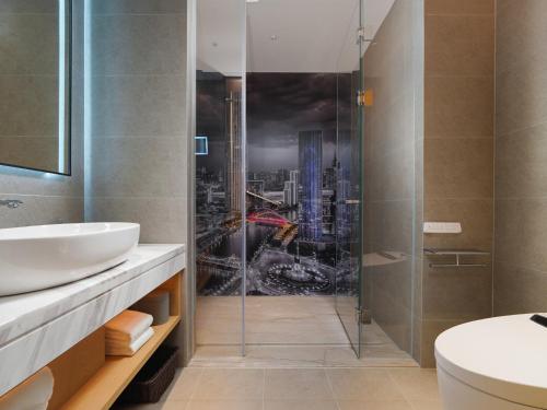 Imagen general del Hotel Park Inn by Radisson Tianjin Jinghai Wanda Plaza. Foto 6