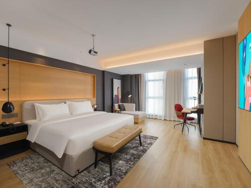 Imagen de la habitación del Hotel Park Inn by Radisson Tianjin Jinghai Wanda Plaza. Foto 11