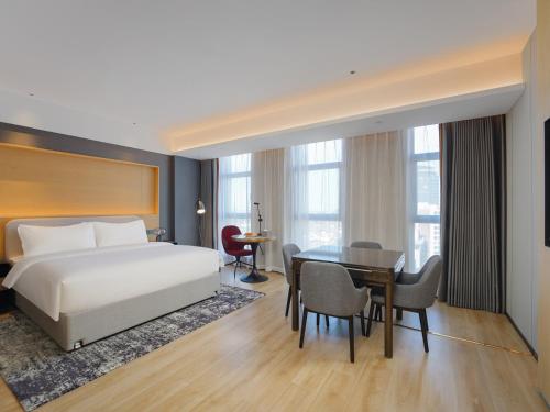 Imagen de la habitación del Hotel Park Inn by Radisson Tianjin Jinghai Wanda Plaza. Foto 12