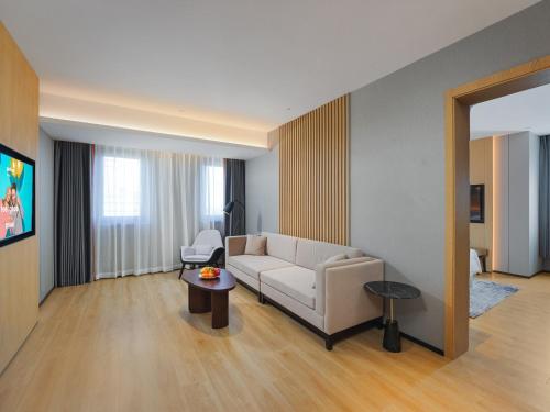 Imagen de la habitación del Hotel Park Inn by Radisson Tianjin Jinghai Wanda Plaza. Foto 15