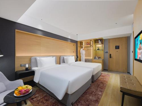 Imagen de la habitación del Hotel Park Inn by Radisson Tianjin Jinghai Wanda Plaza. Foto 16