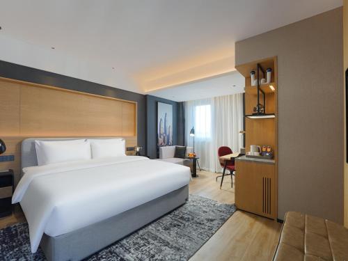 Imagen de la habitación del Hotel Park Inn by Radisson Tianjin Jinghai Wanda Plaza. Foto 17