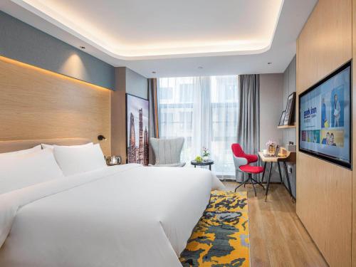 Imagen general del Hotel Park Inn by Radisson Tongling The City Core. Foto 2