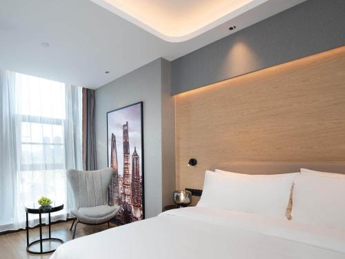 Imagen general del Hotel Park Inn by Radisson Tongling The City Core. Foto 5