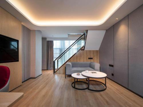 Imagen de la habitación del Hotel Park Inn by Radisson Tongling The City Core. Foto 18