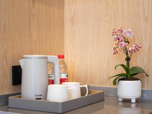 Imagen de la habitación del Hotel Park Inn by Radisson Tongling The City Core. Foto 19