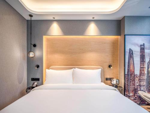 Imagen de la habitación del Hotel Park Inn by Radisson Tongling The City Core. Foto 20