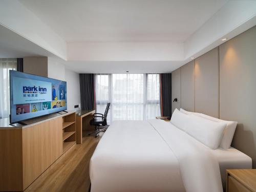 Imagen de la habitación del Hotel Park Inn by Radisson Wenzhou Longwan International Airport Wanda Plaza. Foto 9