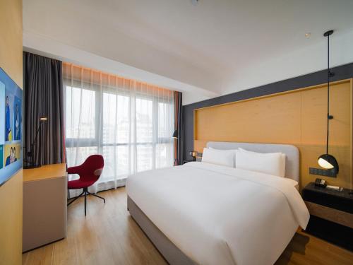 Imagen de la habitación del Hotel Park Inn by Radisson Wenzhou Longwan International Airport Wanda Plaza. Foto 10