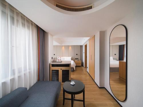 Imagen de la habitación del Hotel Park Inn by Radisson Wenzhou Longwan International Airport Wanda Plaza. Foto 19