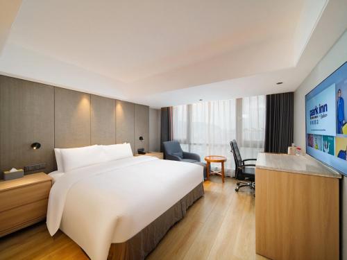 Imagen de la habitación del Hotel Park Inn by Radisson Wenzhou Longwan International Airport Wanda Plaza. Foto 20