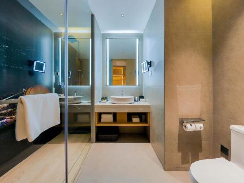 Imagen de la habitación del Hotel Park Inn by Radisson Zhuhai Gaolan Port. Foto 8