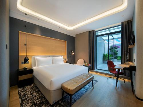 Imagen de la habitación del Hotel Park Inn by Radisson Zhuhai Gaolan Port. Foto 10