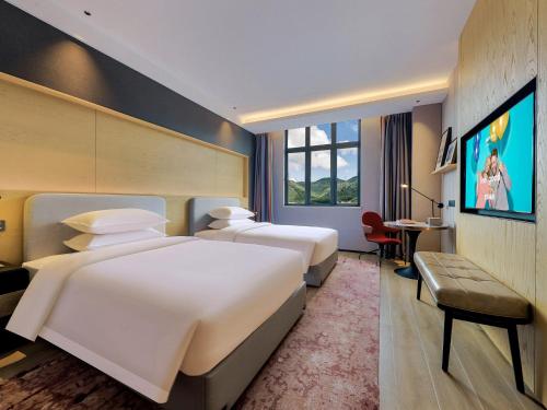 Imagen de la habitación del Hotel Park Inn by Radisson Zhuhai Gaolan Port. Foto 12