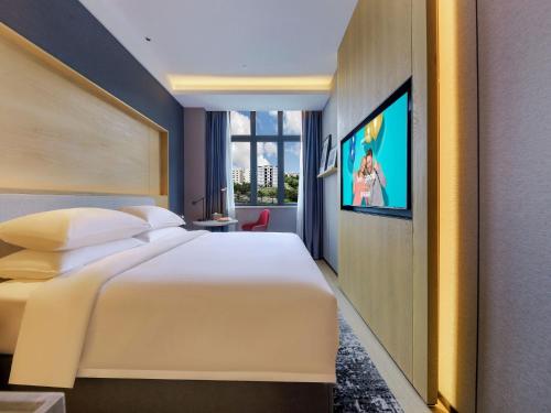 Imagen de la habitación del Hotel Park Inn by Radisson Zhuhai Gaolan Port. Foto 15