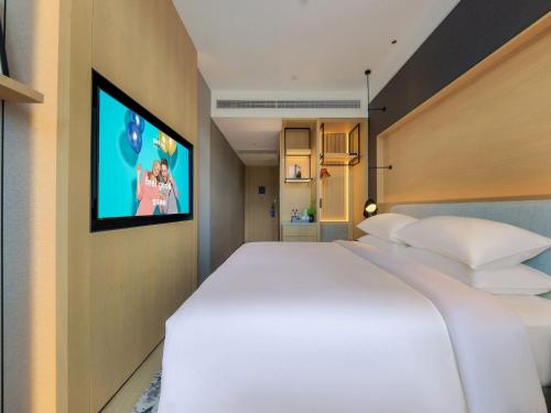 Imagen de la habitación del Hotel Park Inn by Radisson Zhuhai Gaolan Port. Foto 17