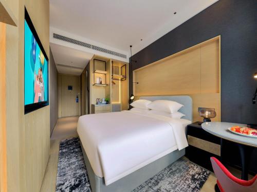 Imagen de la habitación del Hotel Park Inn by Radisson Zhuhai Gaolan Port. Foto 18