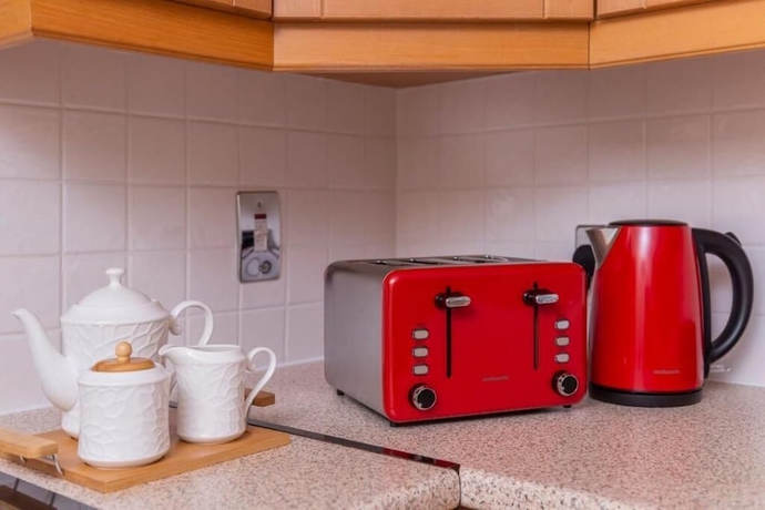 Imagen de la habitación del Hotel Park Place Apartments. Foto 15