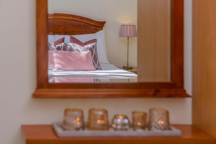 Imagen de la habitación del Hotel Park Place Apartments. Foto 17