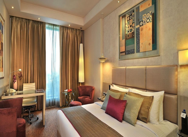 Imagen de la habitación del Hotel Park Plaza Faridabad. Foto 7