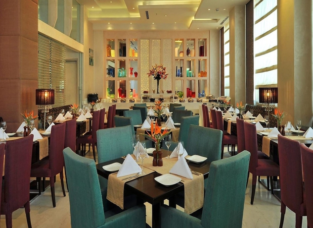 Imagen del bar/restaurante del Hotel Park Plaza Faridabad. Foto 4
