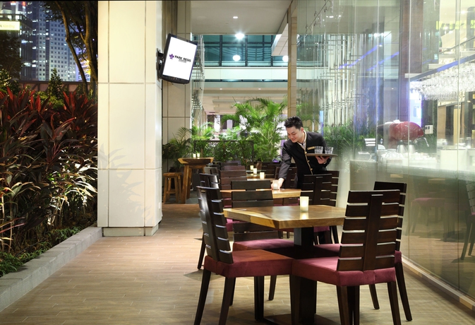 Imagen del bar/restaurante del Hotel Park Regis Singapore. Foto 4
