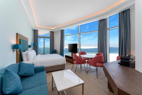 Imagen de la habitación del Hotel Park Regis by Prince Dubai Islands. Foto 20