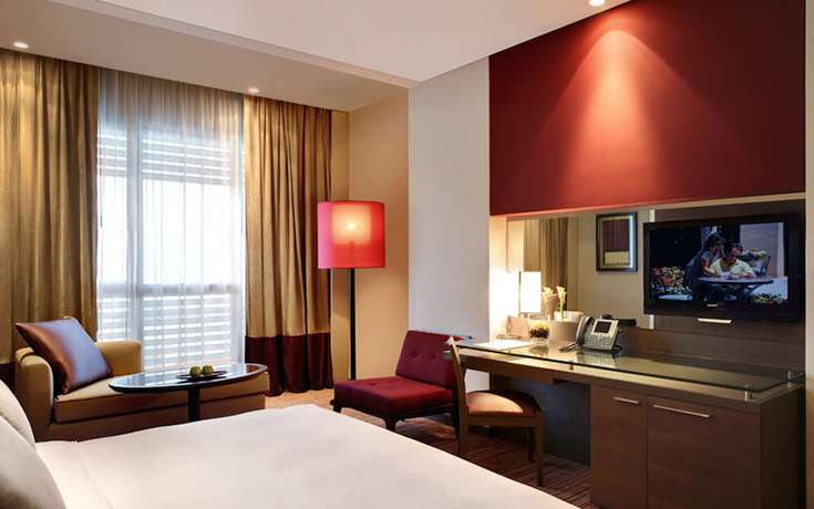 Imagen de la habitación del Hotel Park Rotana. Foto 8