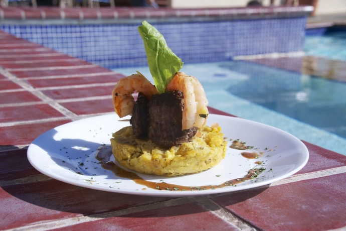 Imagen del bar/restaurante del Hotel Park Royal Homestay Club Cala Puerto Rico. Foto 4