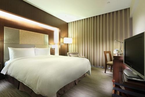 Imagen de la habitación del Hotel Park Taipei. Foto 6