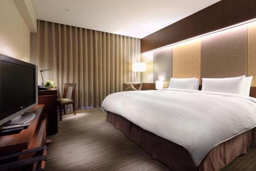 Imagen de la habitación del Hotel Park Taipei. Foto 7
