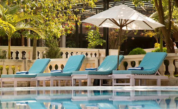 Imagen de la piscina del Hotel Park Village Hotel & Resort. Foto 15