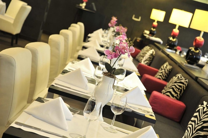 Imagen del bar/restaurante del Hotel Parker Brussels Airport. Foto 3