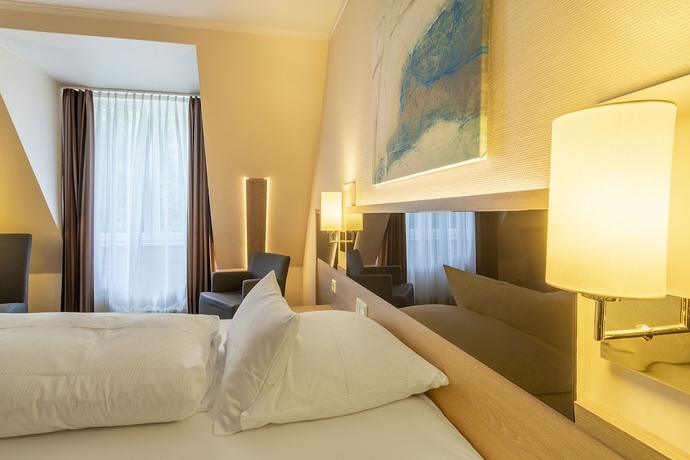 Imagen de la habitación del Hotel Parkhotel Berghoelzchen. Foto 5