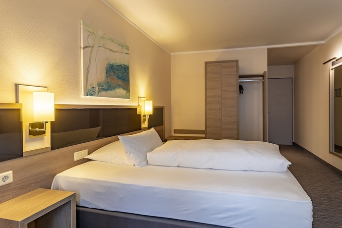 Imagen de la habitación del Hotel Parkhotel Berghoelzchen. Foto 10